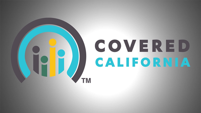 Covered California logo with silver background